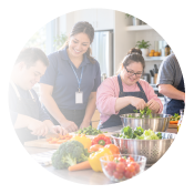 Young adults preparing vegetables together