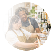 Young adult baking with a mentor